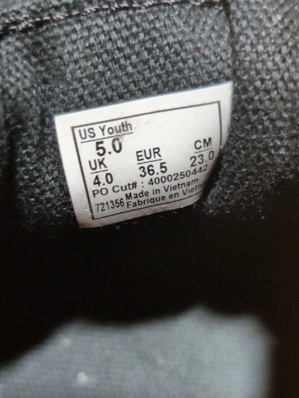 Vans youth Black Canvas Low-Top Sneakers with White Sole size 5